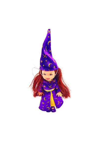 1999 Mattel Kelly Club "Wizard Melody" doll, part of the Li'l Friends of Kelly collection.The doll is featured wearing a purple wizard costume adorned with gold stars and moons.