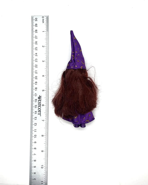 1999 Mattel Kelly Club "Wizard Melody" doll, part of the Li'l Friends of Kelly collection.The doll is featured wearing a purple wizard costume adorned with gold stars and moons.