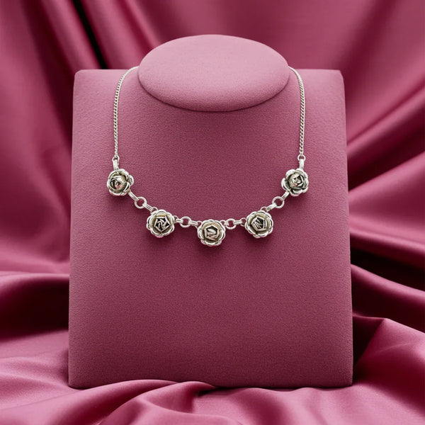 Perfect for vintage jewelry lovers: our Vintage Pretty Silver Tone Rose Necklace provides timeless elegance with delicately crafted rose details. Shop today