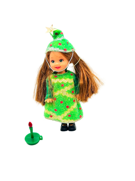 Discover the enchanting 2001 Mattel Barbie Kelly Club "Christmas Tree Chelsie" doll, a cherished piece from a delightful holiday series.