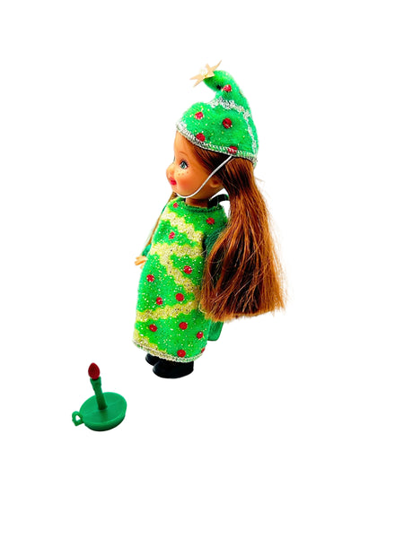 Discover the enchanting 2001 Mattel Barbie Kelly Club "Christmas Tree Chelsie" doll, a cherished piece from a delightful holiday series.