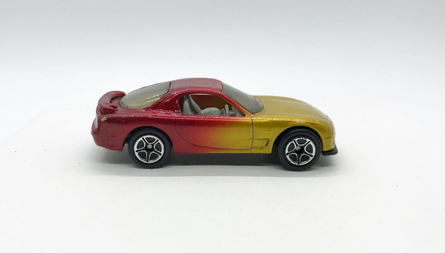 Matchbox Red and Gold Ombre Gold RX-7 (1993) - Lamoree’s Vintage
