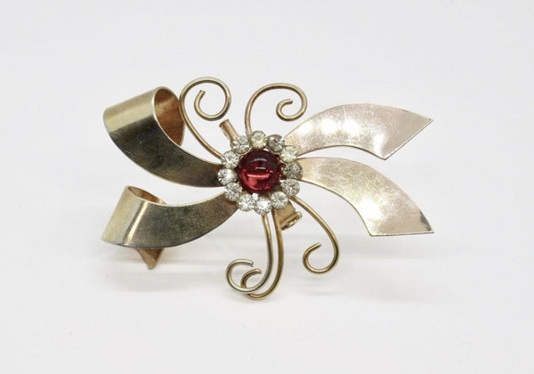 Vintage Bow Brooch with Red Cabochon and Bright Rhinestones - Lamoree’s Vintage
